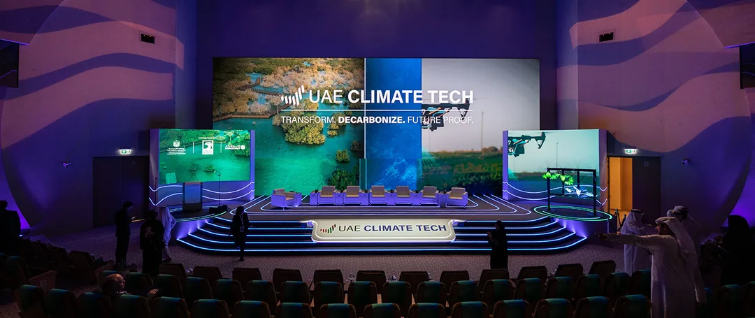 Evolution Scenic illuminated main stage and curved LED backdrops for UAE Climate Tech in Abu Dhabi.