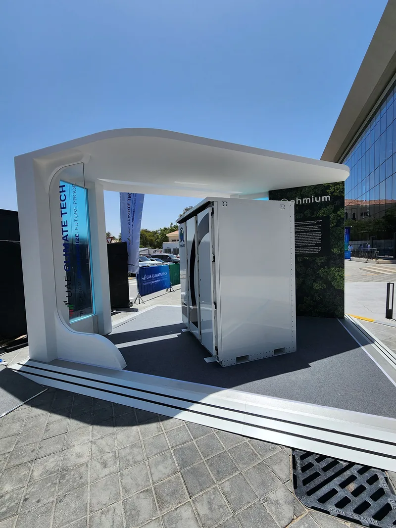 Evolution Scenic outdoor stand with curved canopy, integrated display and branded feature wall.
