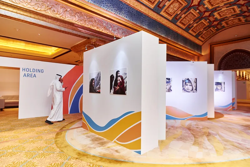 Evolution Scenic photo gallery fit-out with custom display structures for UNIDO Abu Dhabi.