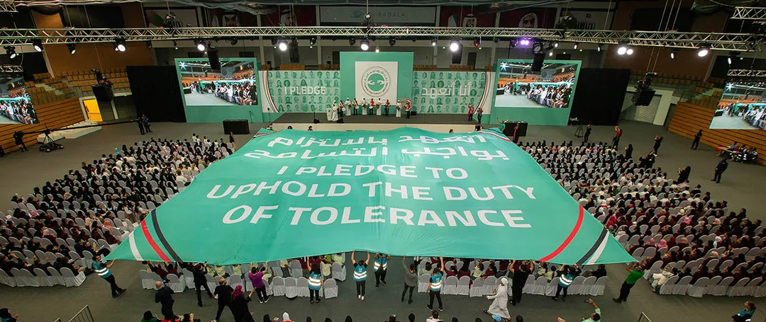 Evolution Scenic integrated stage and branded backdrop for the Youth Tolerance Rally in Abu Dhabi.